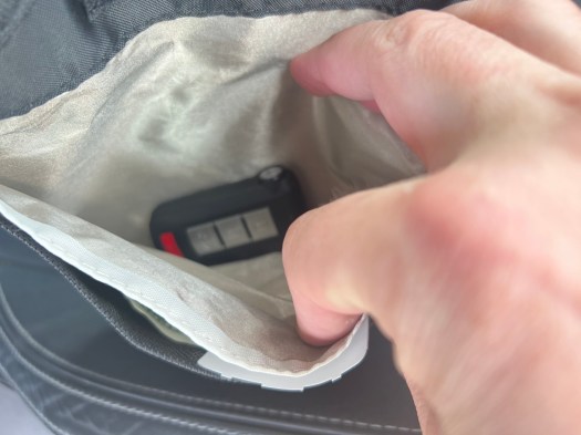 Rear Pocket Holds the Insurance Cards & key fobs.
